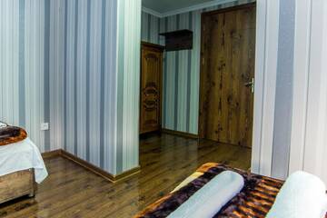 Фото номера Трехместный номер Отель HOTEL GUGLUX &amp;WINE CELLAR г. Телави 5