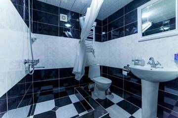 Фото номера Трехместный номер Отель HOTEL GUGLUX &amp;WINE CELLAR г. Телави 6