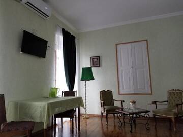 Фото номера Трехместный номер с балконом Гостевой дом Mimino г. Телави 7