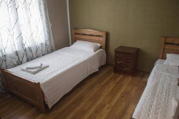Фото номера Просторный двухместный номер с 2 отдельными кроватями Мини-отель Telavi Host Guesthouse in Telavi, Kakhetia г. Телави 5