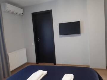 Фото номера Двухместный номер Делюкс с 1 кроватью и ванной Гостевой дом Sunset Telavi г. Телави 8