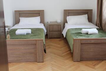 Фото номера Двухместный номер с 2 отдельными кроватями Гостевой дом Guest House Chiko г. Телави 4