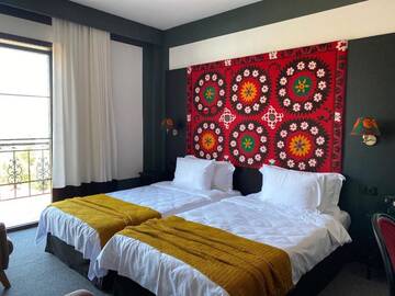 Фото номера Двухместный номер Делюкс с 2 отдельными кроватями Отель Esquisse Boutique Hotel г. Телави 5