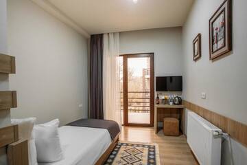 Фото номера Стандартный одноместный номер Отель Telavi Inn г. Телави 4